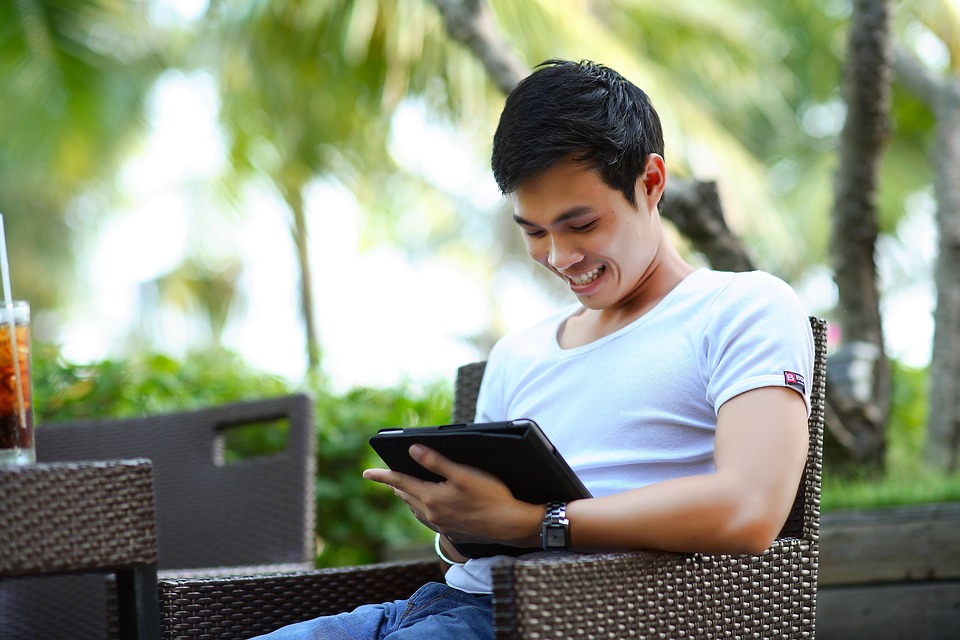 man with tablet
